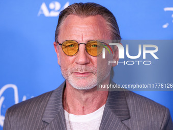 Daniel Craig arrives at the Los Angeles Premiere Of A24's 'Queer' held at the Directors Guild of America Theater Complex on November 13, 202...