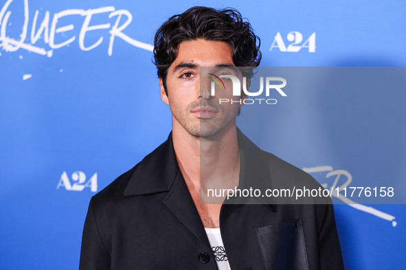 Taylor Zakhar Perez arrives at the Los Angeles Premiere Of A24's 'Queer' held at the Directors Guild of America Theater Complex on November...