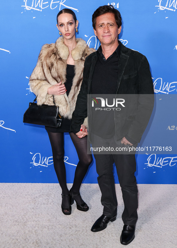 Bailey Mikel and Clifton Collins Jr. arrive at the Los Angeles Premiere Of A24's 'Queer' held at the Directors Guild of America Theater Comp...