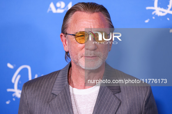 Daniel Craig arrives at the Los Angeles Premiere Of A24's 'Queer' held at the Directors Guild of America Theater Complex on November 13, 202...