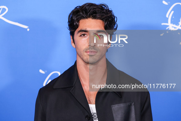 Taylor Zakhar Perez arrives at the Los Angeles Premiere Of A24's 'Queer' held at the Directors Guild of America Theater Complex on November...