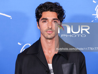 Taylor Zakhar Perez arrives at the Los Angeles Premiere Of A24's 'Queer' held at the Directors Guild of America Theater Complex on November...