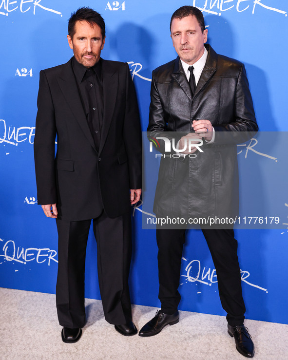 Trent Reznor and Atticus Ross arrive at the Los Angeles Premiere Of A24's 'Queer' held at the Directors Guild of America Theater Complex on...