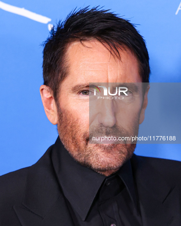 Trent Reznor arrives at the Los Angeles Premiere Of A24's 'Queer' held at the Directors Guild of America Theater Complex on November 13, 202...