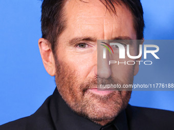 Trent Reznor arrives at the Los Angeles Premiere Of A24's 'Queer' held at the Directors Guild of America Theater Complex on November 13, 202...