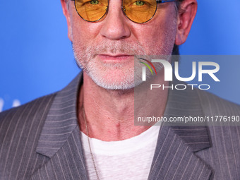 Daniel Craig arrives at the Los Angeles Premiere Of A24's 'Queer' held at the Directors Guild of America Theater Complex on November 13, 202...