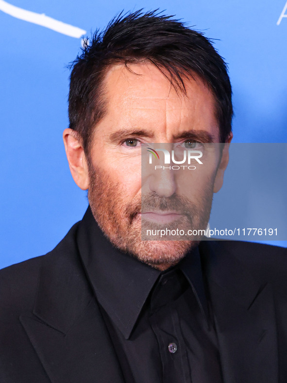 Trent Reznor arrives at the Los Angeles Premiere Of A24's 'Queer' held at the Directors Guild of America Theater Complex on November 13, 202...