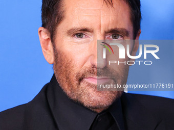 Trent Reznor arrives at the Los Angeles Premiere Of A24's 'Queer' held at the Directors Guild of America Theater Complex on November 13, 202...