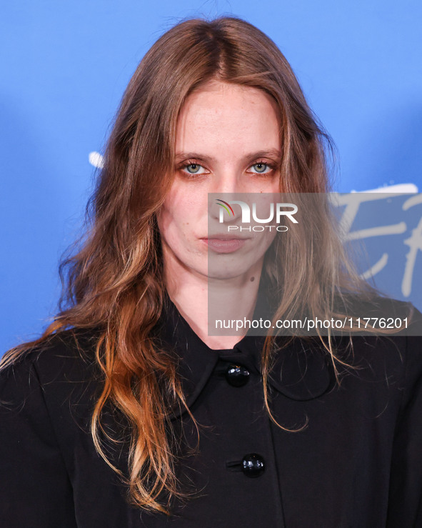 Petra Collins arrives at the Los Angeles Premiere Of A24's 'Queer' held at the Directors Guild of America Theater Complex on November 13, 20...