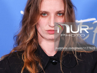 Petra Collins arrives at the Los Angeles Premiere Of A24's 'Queer' held at the Directors Guild of America Theater Complex on November 13, 20...