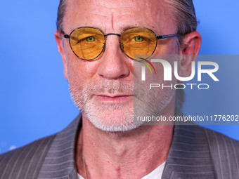 Daniel Craig arrives at the Los Angeles Premiere Of A24's 'Queer' held at the Directors Guild of America Theater Complex on November 13, 202...