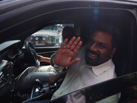 Sri Lankan president Anura Kumara Dissanayake acknowledges his supporters after casting his vote for the parliamentary election in Colombo,...