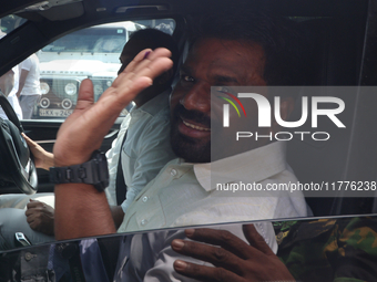 Sri Lankan president Anura Kumara Dissanayake acknowledges his supporters after casting his vote for the parliamentary election in Colombo,...