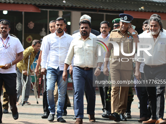 Sri Lankan president Anura Kumara Dissanayake acknowledges his supporters after casting his vote for the parliamentary election in Colombo,...