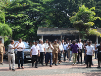 Sri Lankan president Anura Kumara Dissanayake acknowledges his supporters as he arrives to cast a vote for the parliamentary election in Col...