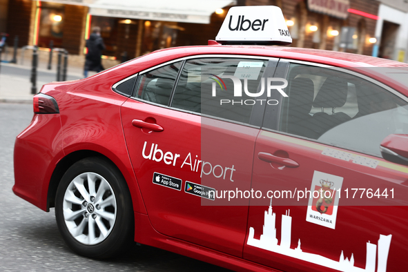 Uber Airport logo is seen on a car in Warsaw, Poland on November 13, 2024. 