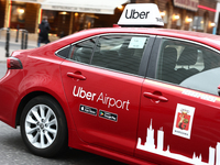 Uber Airport logo is seen on a car in Warsaw, Poland on November 13, 2024. (