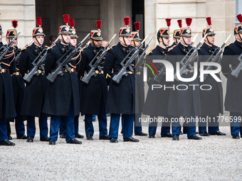 A Presidential Guard stands at the Elysee Palace during the state visit of Ghanaian President Nana Akufo-Addo for a bilateral summit with Em...