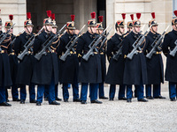 A Presidential Guard stands at the Elysee Palace during the state visit of Ghanaian President Nana Akufo-Addo for a bilateral summit with Em...