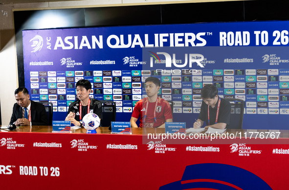 Japan head coach Hajime Moriyasu and Wataru Endo speak during a press conference before facing the Indonesia national team during the FIFA W...