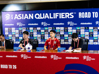 Japan head coach Hajime Moriyasu and Wataru Endo speak during a press conference before facing the Indonesia national team during the FIFA W...