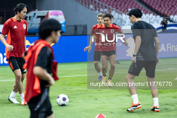 Yuto Nagatomo of Japan attends a training session before facing the Indonesia national team during the FIFA World Cup Asian 3rd Qualifier Gr...