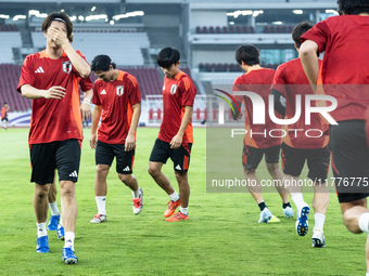 Players of Japan attend a training session before facing the Indonesian national team during the FIFA World Cup Asian 3rd Qualifier Group C...