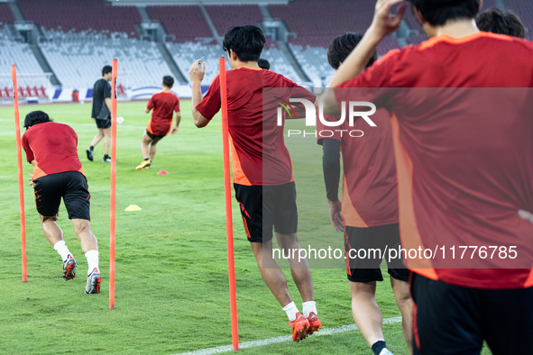 Players of Japan attend a training session before facing the Indonesian national team during the FIFA World Cup Asian 3rd Qualifier Group C...