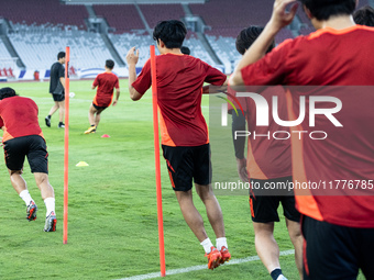 Players of Japan attend a training session before facing the Indonesian national team during the FIFA World Cup Asian 3rd Qualifier Group C...