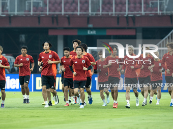 Players of Japan attend a training session before facing the Indonesian national team during the FIFA World Cup Asian 3rd Qualifier Group C...