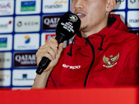 Jay Noah Idzes of Indonesia speaks during a press conference before facing the Japan national team during the FIFA World Cup Asian 3rd Quali...