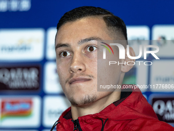 Jay Noah Idzes of Indonesia speaks during a press conference before facing the Japan national team during the FIFA World Cup Asian 3rd Quali...