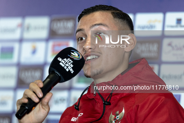 Jay Noah Idzes of Indonesia speaks during a press conference before facing the Japan national team during the FIFA World Cup Asian 3rd Quali...