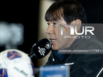 Head coach Shin Tae-Yong of Indonesia speaks during a press conference before facing the Japan national team during the FIFA World Cup Asian...