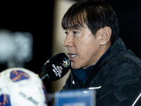 Head coach Shin Tae-Yong of Indonesia speaks during a press conference before facing the Japan national team during the FIFA World Cup Asian...