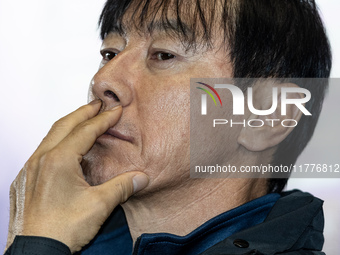 Head coach Shin Tae-Yong of Indonesia speaks during a press conference before facing the Japan national team during the FIFA World Cup Asian...