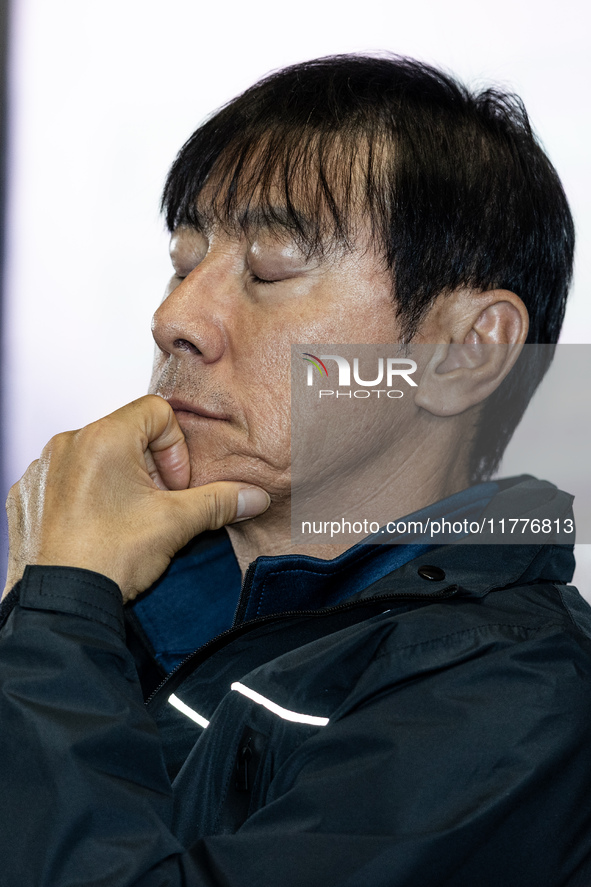 Head coach Shin Tae-Yong of Indonesia speaks during a press conference before facing the Japan national team during the FIFA World Cup Asian...