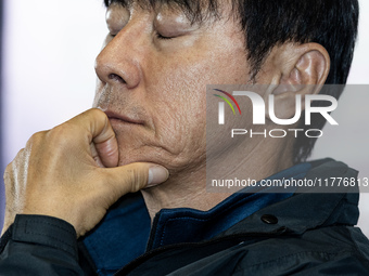 Head coach Shin Tae-Yong of Indonesia speaks during a press conference before facing the Japan national team during the FIFA World Cup Asian...