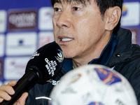 Head coach Shin Tae-Yong of Indonesia speaks during a press conference before facing the Japan national team during the FIFA World Cup Asian...