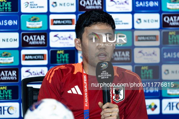 Wataru Endo of Japan speaks during a press conference before facing the Indonesia national team during the FIFA World Cup Asian 3rd Qualifie...