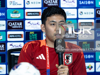 Wataru Endo of Japan speaks during a press conference before facing the Indonesia national team during the FIFA World Cup Asian 3rd Qualifie...