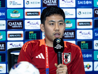 Wataru Endo of Japan speaks during a press conference before facing the Indonesia national team during the FIFA World Cup Asian 3rd Qualifie...