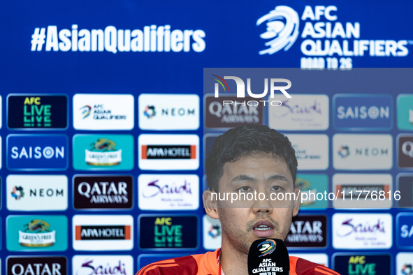 Wataru Endo of Japan speaks during a press conference before facing the Indonesia national team during the FIFA World Cup Asian 3rd Qualifie...