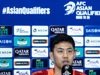 Wataru Endo of Japan speaks during a press conference before facing the Indonesia national team during the FIFA World Cup Asian 3rd Qualifie...