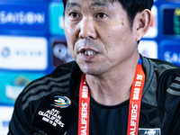 Japan head coach Hajime Moriyasu speaks during a press conference before facing the Indonesia national team during the FIFA World Cup Asian...