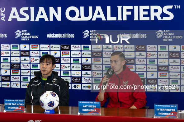 Head coach Shin Tae-Yong of Indonesia and Jay Noah Idzes speak during a press conference before facing the Japan national team during the FI...