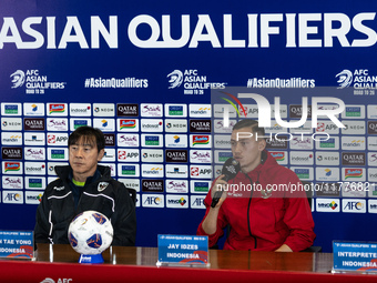 Head coach Shin Tae-Yong of Indonesia and Jay Noah Idzes speak during a press conference before facing the Japan national team during the FI...