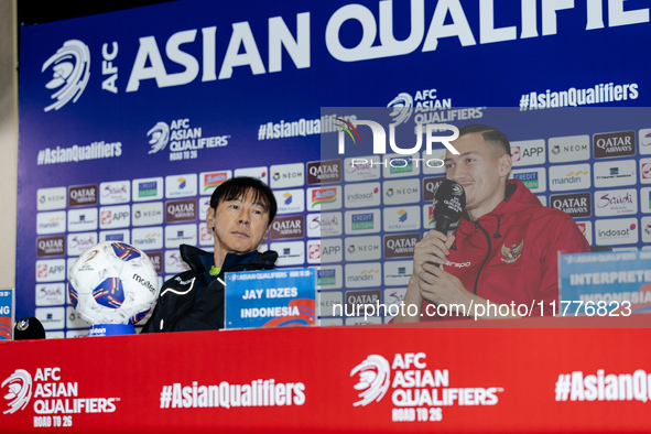 Head coach Shin Tae-Yong of Indonesia and Jay Noah Idzes speak during a press conference before facing the Japan national team during the FI...