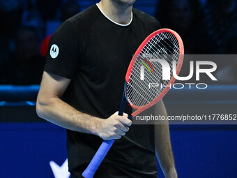 Taylor Fritz (USA) competes against Alex de Minaur (AUS) during day five of the Nitto ATP Finals 2024 at Inalpi Arena in Turin, Italy, on No...