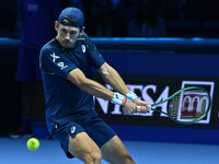 Alex de Minaur (AUS) competes against Taylor Fritz (USA) during day five of the Nitto ATP finals 2024 at Inalpi Arena in Turin, Italy, on No...